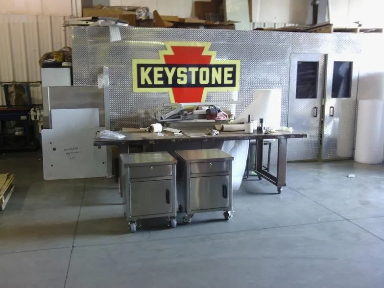 Fabricated carts on shop floor at Keystone Fabricating Inc.